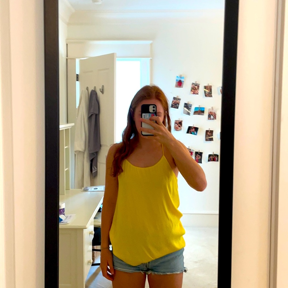 Yellow sleeveless blouse